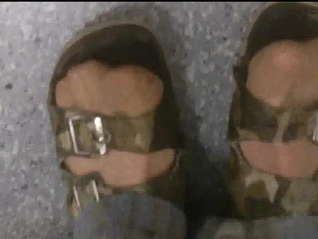 Camouflage Latschen im Regen